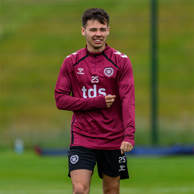 Tait Departs
